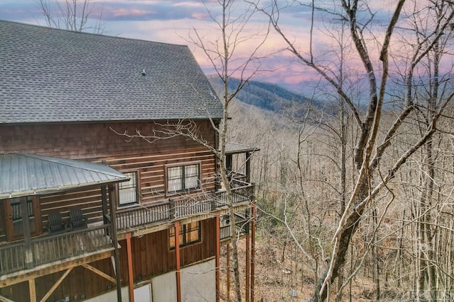 view of property exterior at dusk