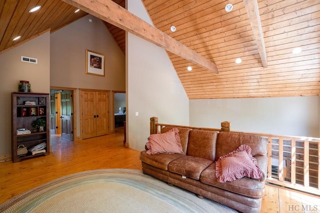 living room featuring beamed ceiling, wood ceiling, high vaulted ceiling, and light wood-type flooring