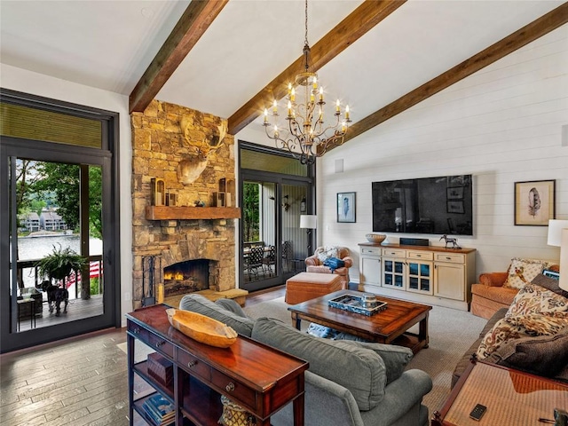 64 Toxaway Shrs Unit 2, Lake Toxaway, NC 28747 - living room featuring a chandelier, hardwood / wood-style flooring, a fireplace, and wooden walls