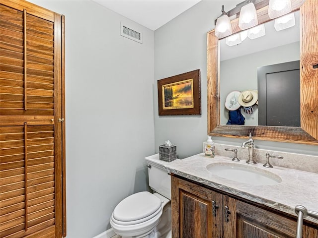 64 Toxaway Shrs Unit 2, Lake Toxaway, NC 28747 - half bathroom featuring toilet and vanity