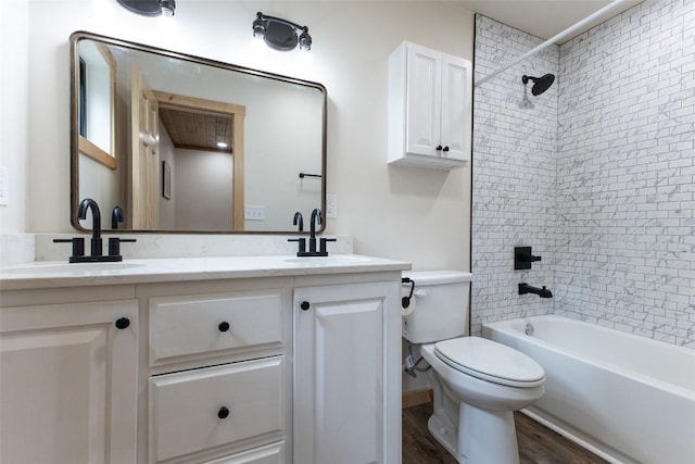 67 Chipmunk Trl, Glenville, NC 28736 - full bathroom featuring wood finished floors, toilet, double vanity, and shower / washtub combination