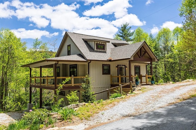 67 Chipmunk Trl, Glenville, NC 28736 - rustic home with a shingled roof and a porch