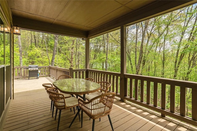 44 No End Cir, Cullowhee, NC 28723 - deck featuring outdoor dining area, a wooded view, and a grill