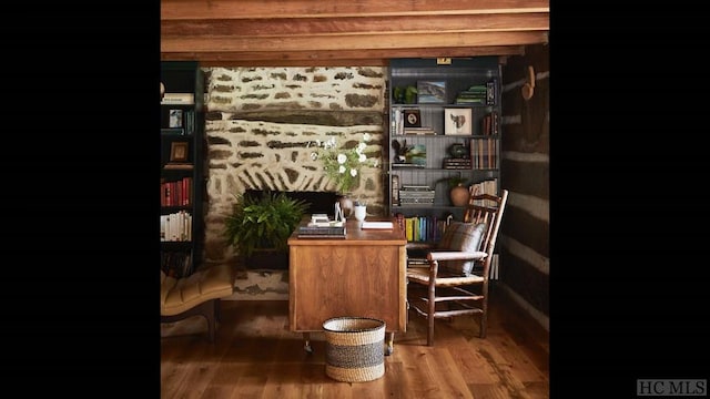 sitting room featuring wood-type flooring