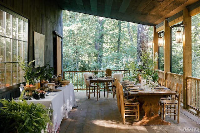 sunroom / solarium with wooden ceiling and plenty of natural light