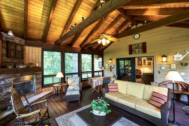 40 Piney Ridge Ct, Sapphire, NC 28774 - living room with hardwood / wood-style flooring, wood walls, wooden ceiling, a stone fireplace, and a ceiling fan