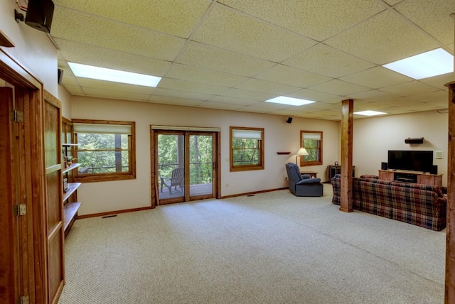 40 Piney Ridge Ct, Sapphire, NC 28774 - carpeted living area with baseboards and a paneled ceiling