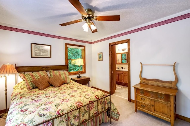 40 Piney Ridge Ct, Sapphire, NC 28774 - bedroom with light carpet, ensuite bath, and a ceiling fan