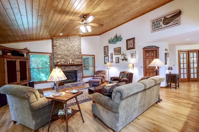 40 Piney Ridge Ct, Sapphire, NC 28774 - living area featuring wooden ceiling, a fireplace, ceiling fan, light wood-style flooring, and crown molding