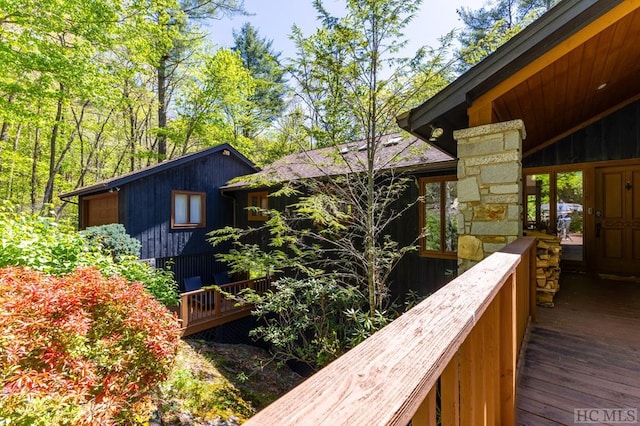 view of property exterior featuring a deck