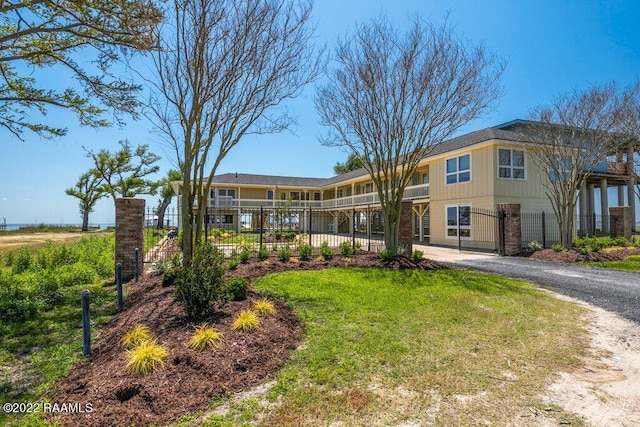 view of front of home with a front yard