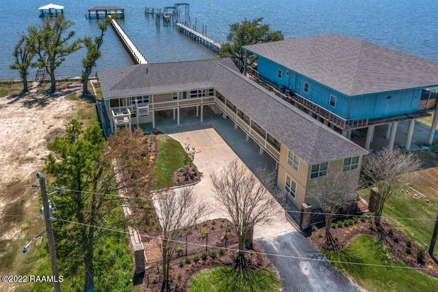 drone / aerial view featuring a water view