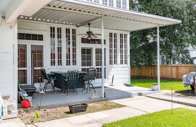 view of patio / terrace featuring ceiling fan