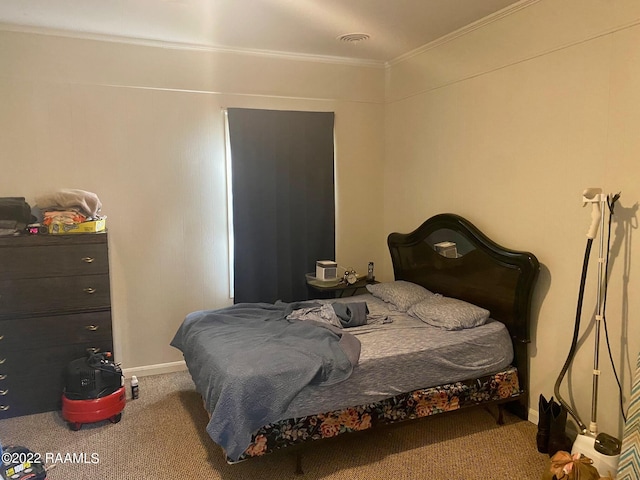 bedroom featuring crown molding and carpet floors