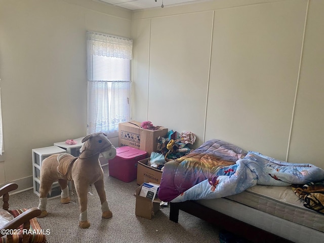 bedroom featuring carpet flooring