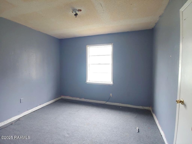 805 Edna St, New Iberia, LA 70560 - unfurnished room featuring a textured ceiling and baseboards