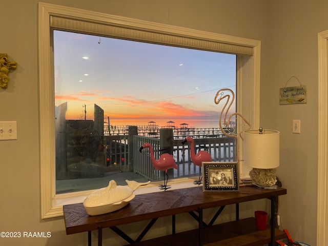 balcony at dusk with a water view