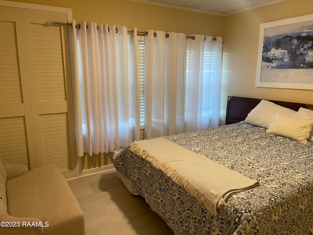 bedroom featuring crown molding