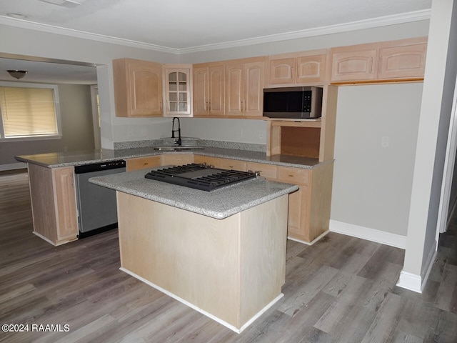 kitchen featuring light brown cabinets, sink, light wood-type flooring, and stainless steel appliances