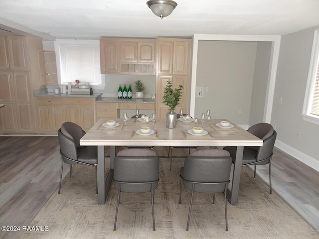 dining room featuring light hardwood / wood-style flooring