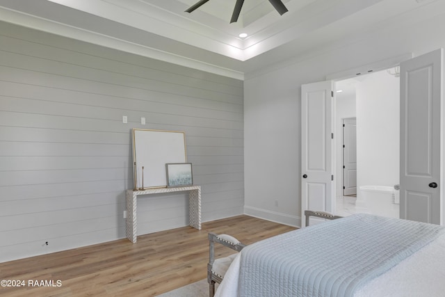 bedroom featuring ceiling fan and light hardwood / wood-style flooring