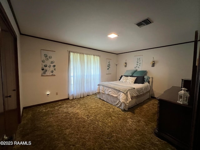 bedroom featuring dark colored carpet