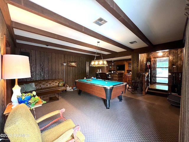 rec room with wooden walls, dark carpet, beam ceiling, and billiards