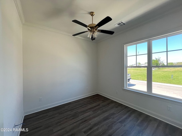 spare room featuring ceiling fan, crown molding, and dark hardwood / wood-style flooring