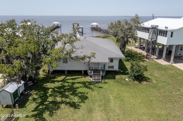 drone / aerial view with a water view