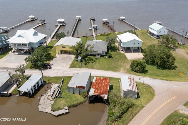 birds eye view of property featuring a water view