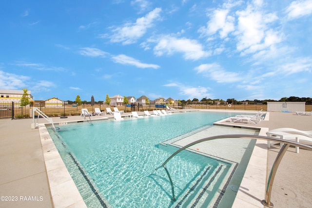 view of pool featuring a patio area