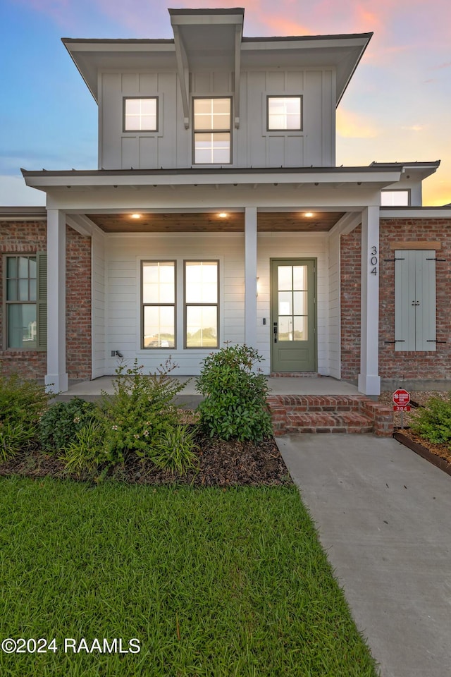 view of front of home featuring covered porch