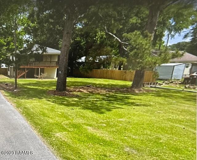 view of yard featuring a deck