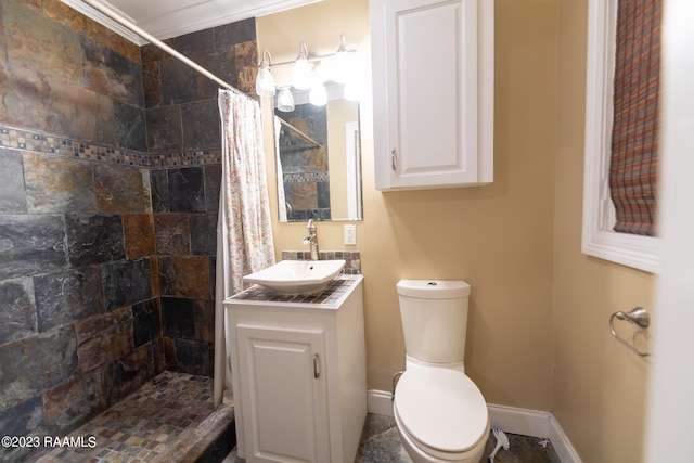 bathroom featuring a shower with curtain, ornamental molding, toilet, and vanity