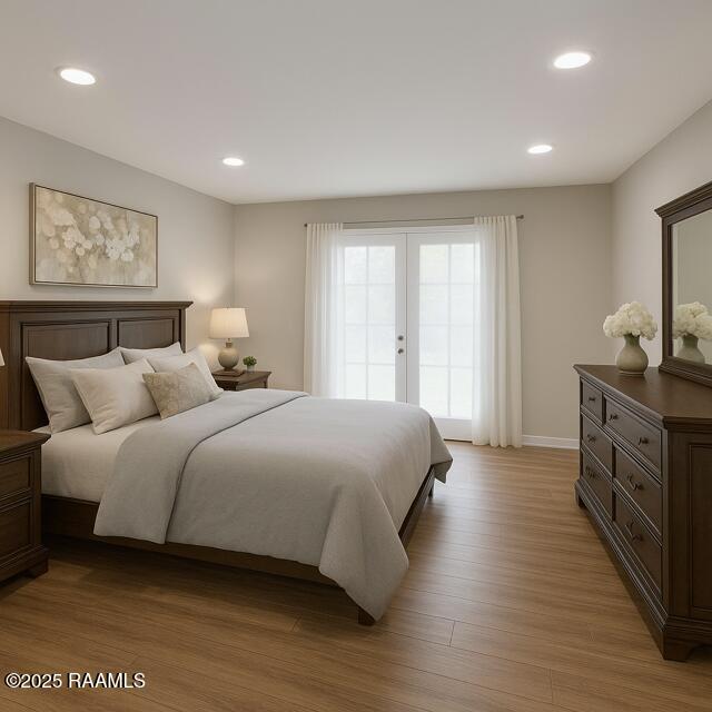 1721 Jane St, New Iberia, LA 70560 - bedroom with light wood finished floors, access to exterior, recessed lighting, baseboards, and french doors