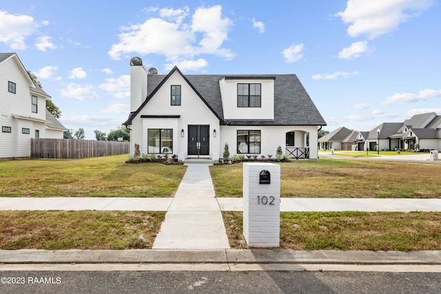 view of front facade with a front yard