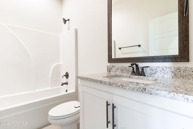 full bath with toilet, vanity, and shower / tub combination