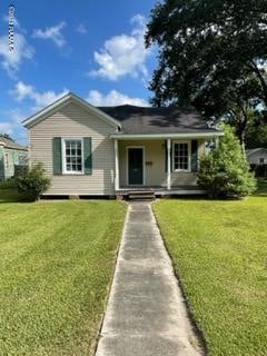 view of front of property with a front lawn