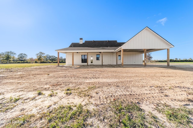 ranch-style house with a carport