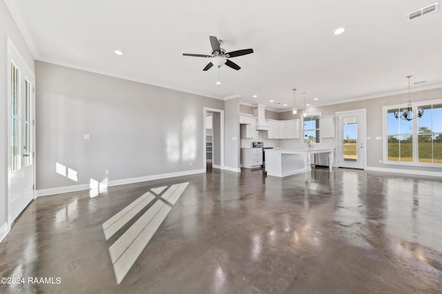 unfurnished living room with ceiling fan with notable chandelier, sink, and crown molding