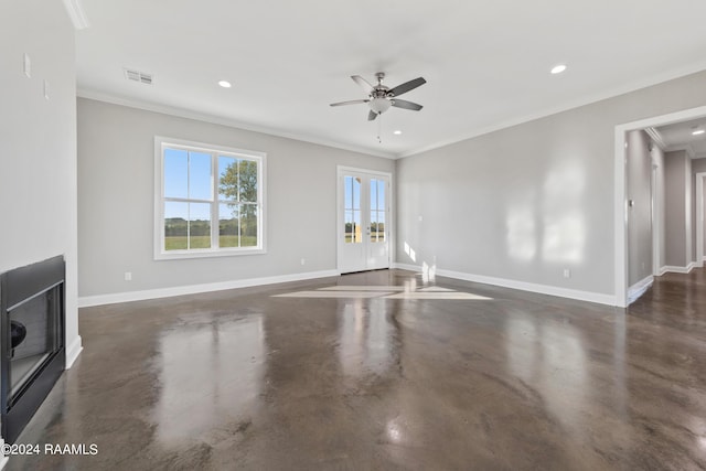 unfurnished living room featuring ceiling fan and crown molding