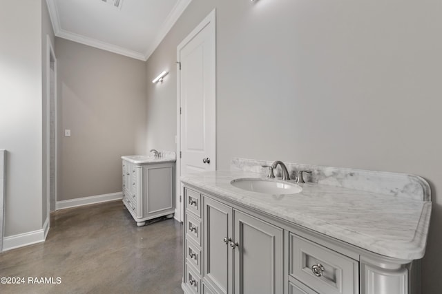 bathroom featuring vanity, concrete floors, and ornamental molding