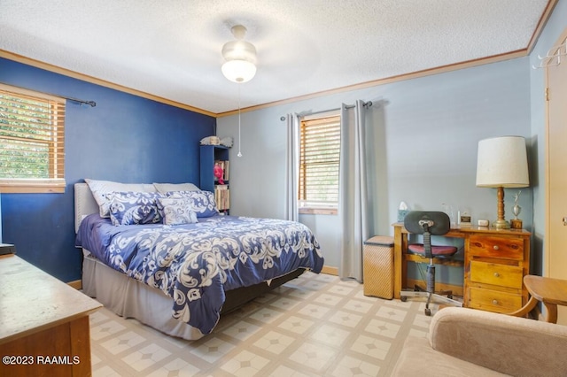 bedroom featuring ornamental molding and a textured ceiling