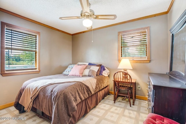 bedroom featuring ornamental molding, ceiling fan, and a textured ceiling