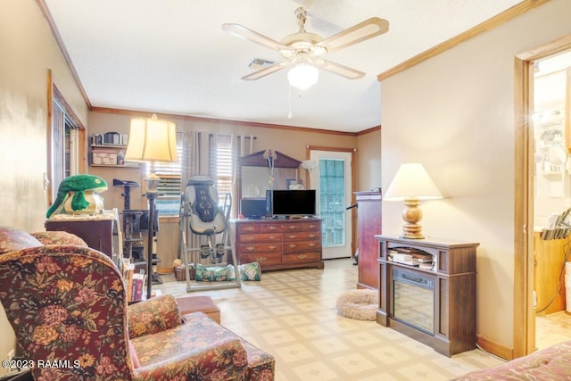 living room featuring crown molding and ceiling fan