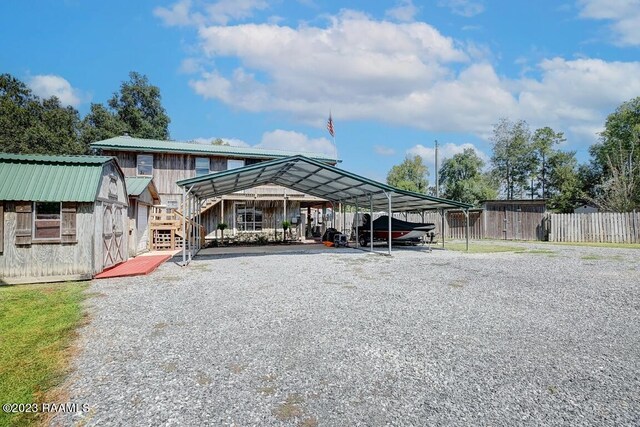 view of car parking featuring a carport