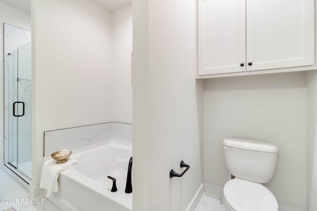 bathroom featuring shower with separate bathtub and toilet