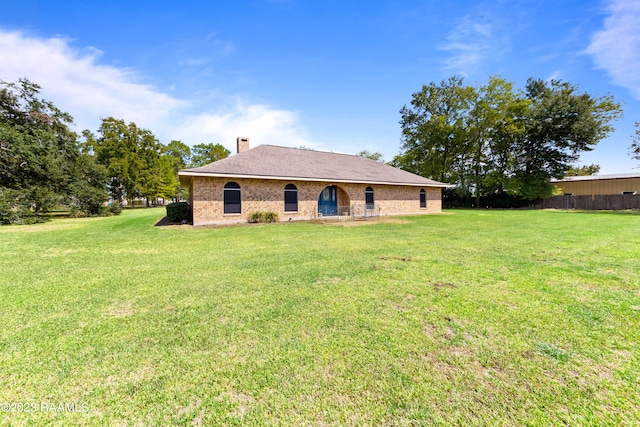 exterior space featuring a lawn