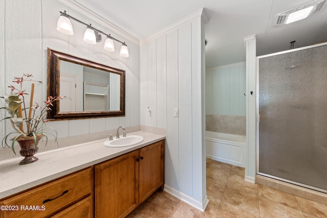 bathroom featuring tile patterned flooring, ornamental molding, shower with separate bathtub, and vanity