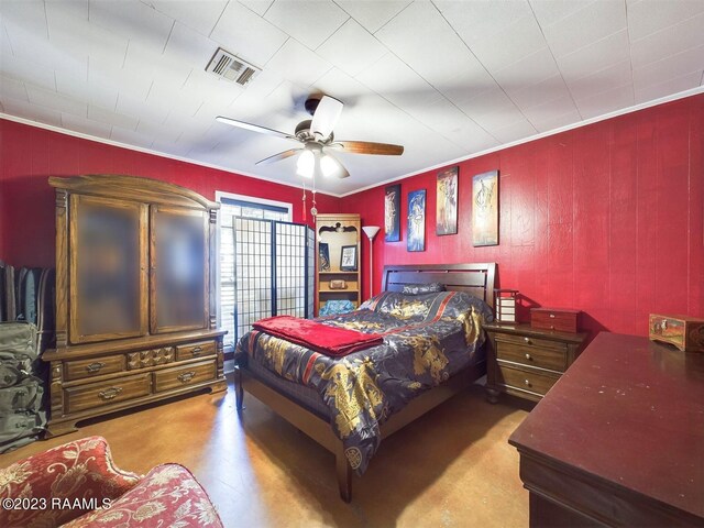 bedroom featuring ceiling fan and ornamental molding